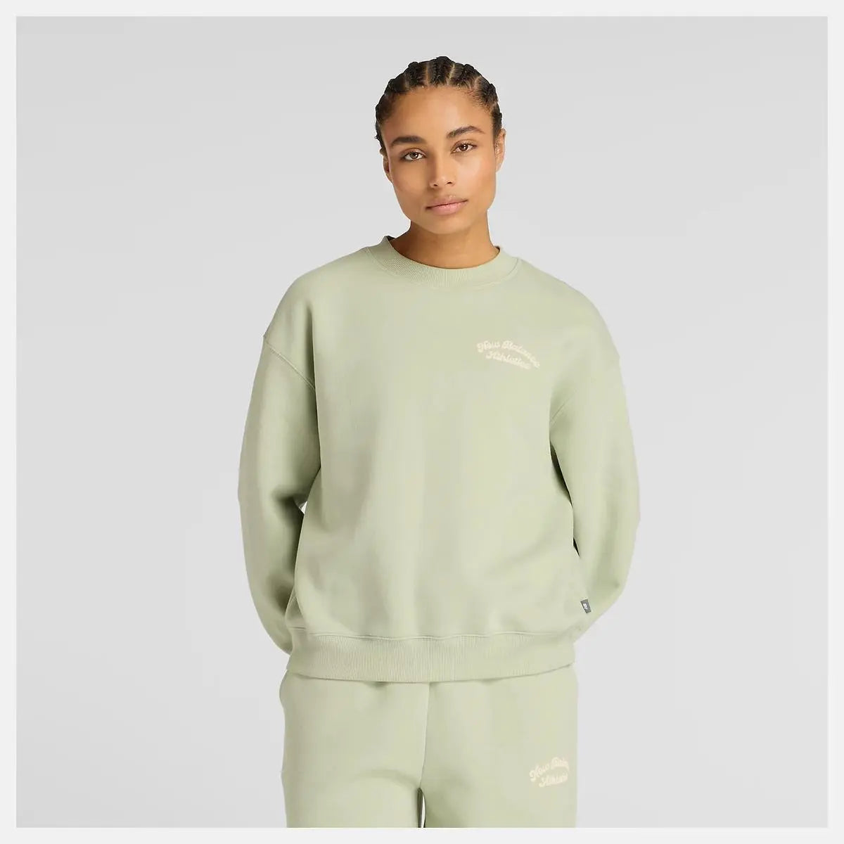 WT53516 LINEAR HERITAGE FLEECE CREW VERDE CHIARO NEW BALANCE
